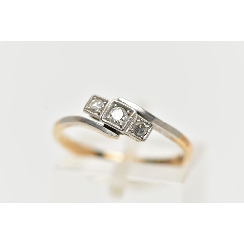 85 - A THREE STONE DIAMOND RING, a central round brilliant cut with two single cut diamonds either side, ... 