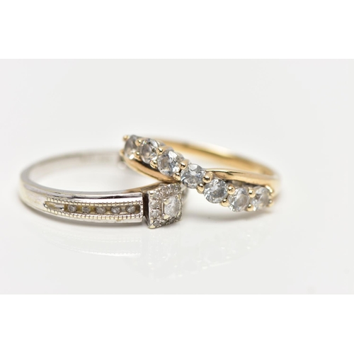 86 - TWO DRESS RINGS, the first a round brilliant diamond set within a square halo of round brilliant cut... 