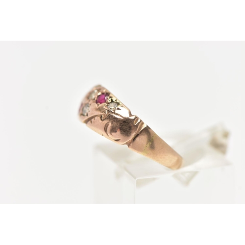 92 - A 9CT GOLD EDWARDIAN RING, four single cut diamonds and two circular cut rubies set within a rose go... 