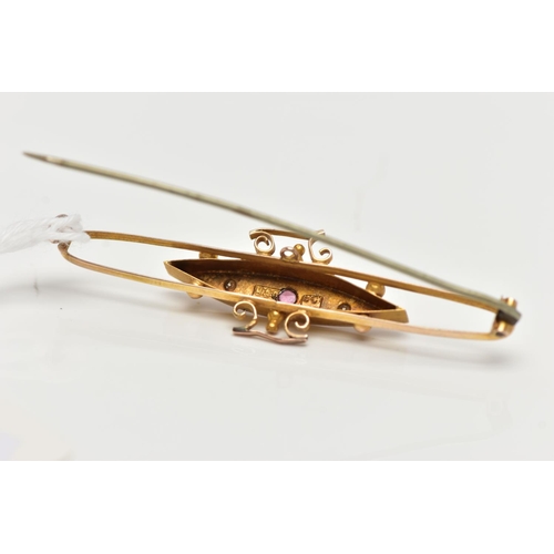 94 - A LATE 19TH CENTURY GOLD BROOCH,  a navette shaped centre positioned upon an open work oval brooch, ... 