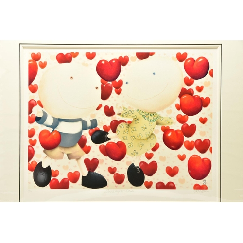 313 - MACKENZIE THORPE (BRITISH 1956) 'DANCING IN LOVE' a limited edition print of figures surrounded by l... 