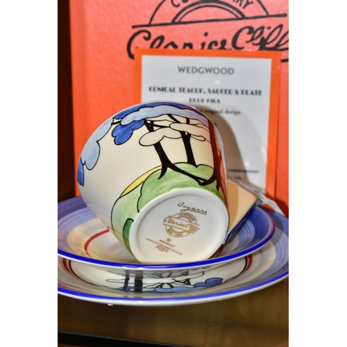 328 - A BOXED WEDGWOOD CLARICE CLIFF LIMITED EDITION 'BLUE FIRS' TRIO, based on an original design by Clar... 