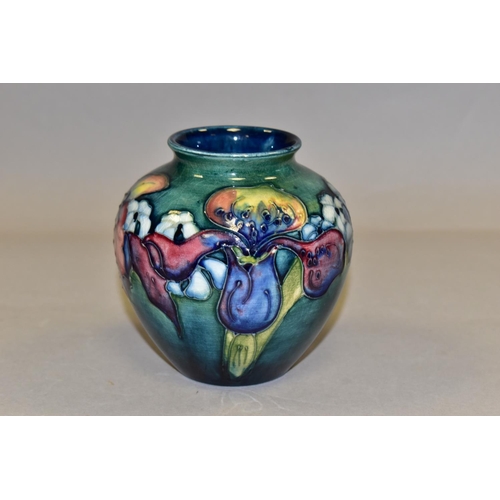 330 - A MOORCROFT POTTERY 'ORCHID' PATTERN VASE, of squat form, tube lined with purple and pale yellow orc... 