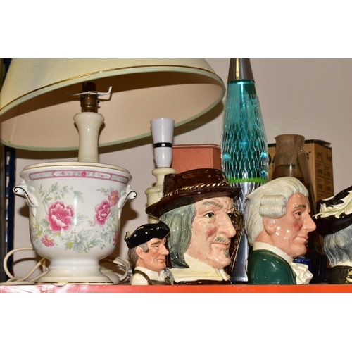 337 - A GROUP OF CHARACTER JUGS AND TABLE LAMPS, to include an Edwardian keyhole shaped mantle clock with ... 