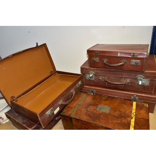 339 - A COLLECTION OF FIVE BROWN VINTAGE SUITCASES AND A WOODEN WRITING SLOPE, comprising five 1950's brow... 