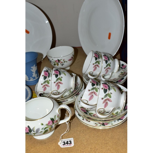 343 - A WEDGWOOD 'HATHAWAY ROSE' PATTERN TEA SET, comprising a milk jug and sugar bowl, six cups, six sauc... 