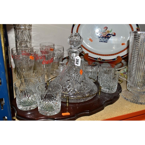 352 - A TUTBURY CRYSTAL SHIP'S DECANTER WITH SIX MATCHING WHISKY TUMBLERS SET ON A WOODEN SERVING TRAY, to... 