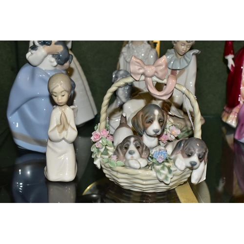 372 - SIX LLADRO AND NAO FIGURES, comprising Lladro 'A Litter of Love' three puppies in a basket, no 1441,... 