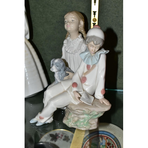 372 - SIX LLADRO AND NAO FIGURES, comprising Lladro 'A Litter of Love' three puppies in a basket, no 1441,... 