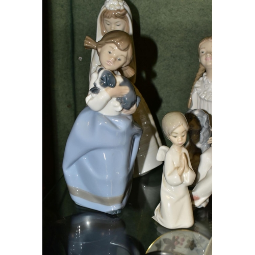 372 - SIX LLADRO AND NAO FIGURES, comprising Lladro 'A Litter of Love' three puppies in a basket, no 1441,... 