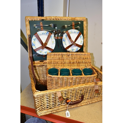 382 - SIX WICKER BASKETS, comprising a small Fortnum and Masons hamper together with a small handled F&M b... 