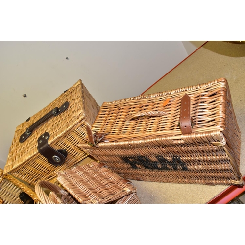 382 - SIX WICKER BASKETS, comprising a small Fortnum and Masons hamper together with a small handled F&M b... 