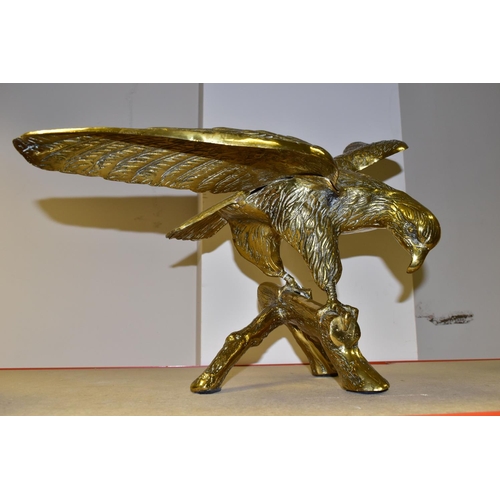 383 - A LARGE, HEAVY BRASS EAGLE PERCHED ON A BRANCH, wings spread, height 44cm to tip of wing (1) (Condit... 