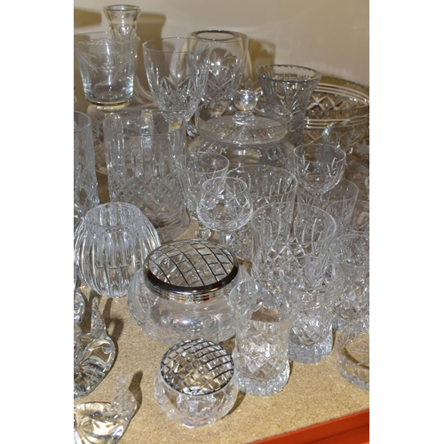 386 - A LARGE QUANTITY OF CUT CRYSTAL AND COLOURED GLASS WARE, comprising a blue and white striped Art Dec... 