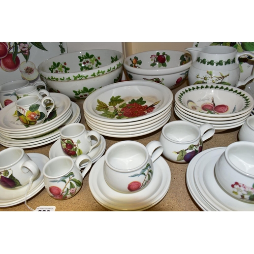 388 - A QUANTITY OF PORTMEIRION DINNER WARES, comprising a large Summer Strawberries bowl (badly cracked a... 