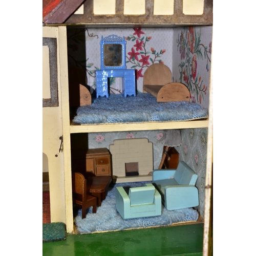 395 - A 1950'S TRIANG DOLL'S HOUSE, No.6 with original curtains and paintwork, height 42cm x width 35cm, s... 