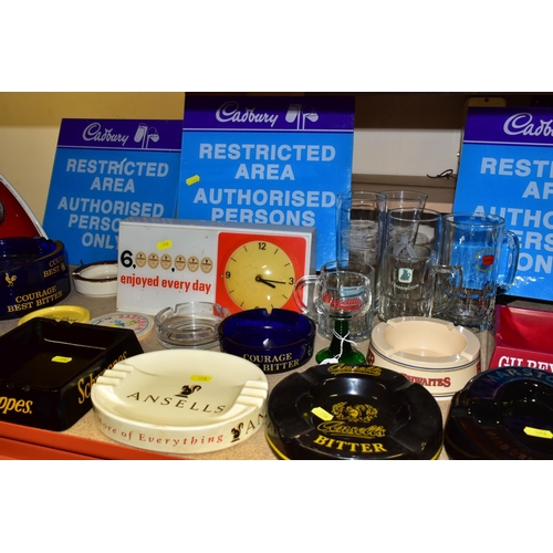 396 - BREWERIANA, A COLLECTION OF VINTAGE PUB ASHTRAYS, GLASSES AND CLOCK, comprising a Guinness advertise... 