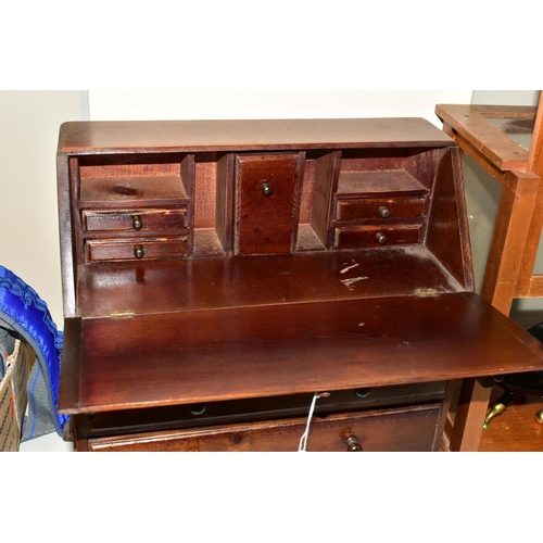 405 - A MINIATURE BUREAU, with stained finish, pull down front revealing internal drawers and compartments... 