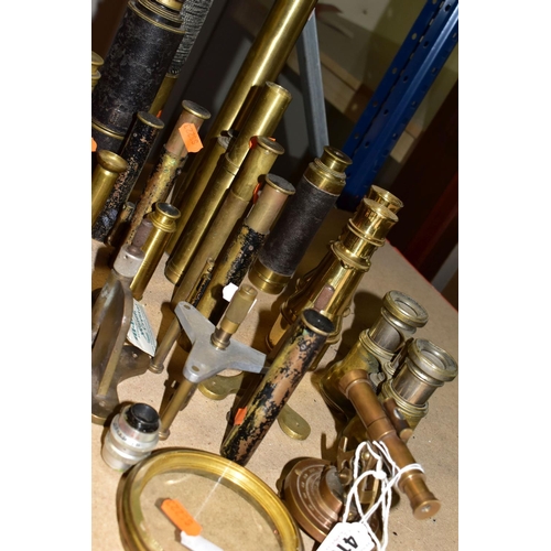 410 - A GROUP OF BRASS BINOCULARS, TELESCOPES, PARTS, LENSES, ETC to include two pairs of brass binoculars... 