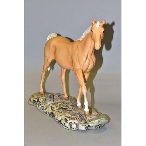 437 - A ROYAL DOULTON 'SUNBURST' FIGURE of a Palomino horse, similar to Beswick model no 2671, in a matt f... 