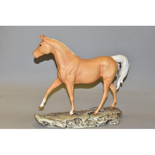 437 - A ROYAL DOULTON 'SUNBURST' FIGURE of a Palomino horse, similar to Beswick model no 2671, in a matt f... 