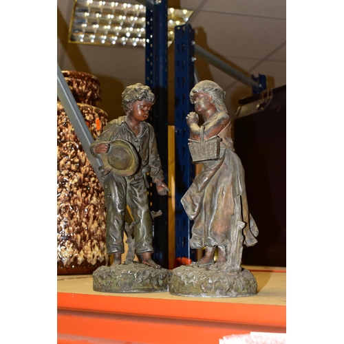 454 - TWO COLD PAINTED SPELTER FIGURES, of a young boy with a straw hat and girl carrying a wicker hamper,... 