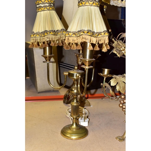 456 - A GROUP OF BRASS TABLE LAMPS, together with a French Provincial grape and wheat sheaf harvest motif ... 