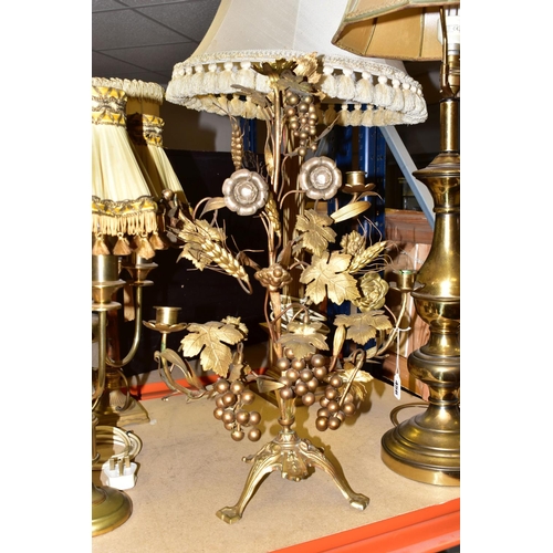 456 - A GROUP OF BRASS TABLE LAMPS, together with a French Provincial grape and wheat sheaf harvest motif ... 