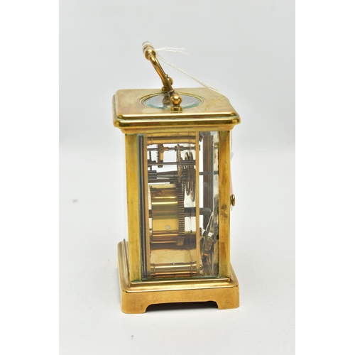 147 - A BRASS CARRIAGE CLOCK, rectangular form, white dial, Roman numerals, four glass viewing panels to t... 