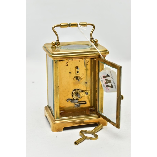 147 - A BRASS CARRIAGE CLOCK, rectangular form, white dial, Roman numerals, four glass viewing panels to t... 