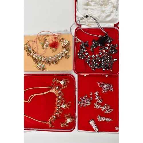 162 - AN ASSORTMENT OF INDIAN COSTUME JEWELLERY, to include three necklace and earring sets, one interchan... 