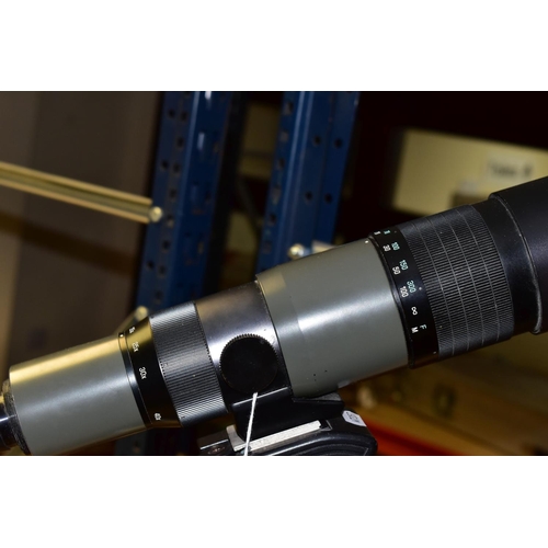 473 - A TAMRON SPOTTING SCOPE AND A TRIPOD, the scope marked 'Zoom 20x-60x' mounted on an adjustable tripo... 