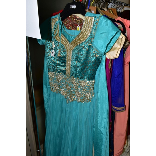 483 - A COLLECTION OF LADIES' SHALWAR KAMEEZ, comprising six Shalwar Kameez with dress and trousers, some ... 