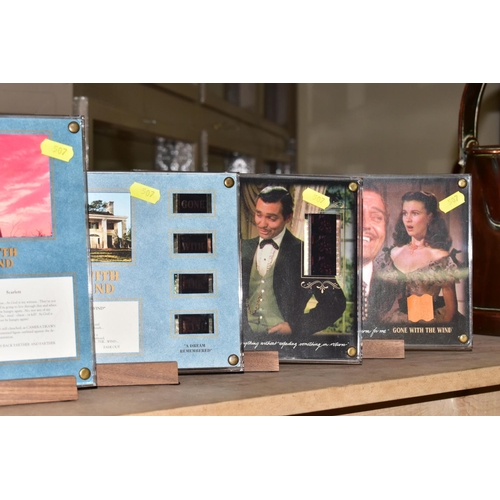 507 - BOXED 'GONE WITH THE WIND' MEMORABILLIA, comprising four limited edition framed montages with illumi... 