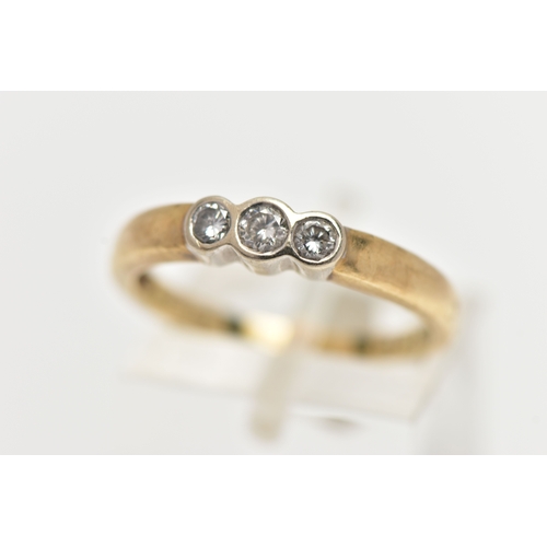 76 - A DIAMOND RING, three round brilliant cut diamonds, approximate total diamond weight 0.25ct, bezel s... 