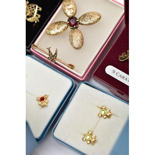 51 - A SELECTION OF YELLOW METAL EARRINGS AND TWO BROOCHES, to include a pair of openwork yellow metal el... 