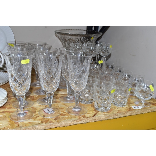 328 - A GROUP OF CUT CRYSTAL, comprising a very heavy and large cut crystal centre piece bowl, height 24cm... 