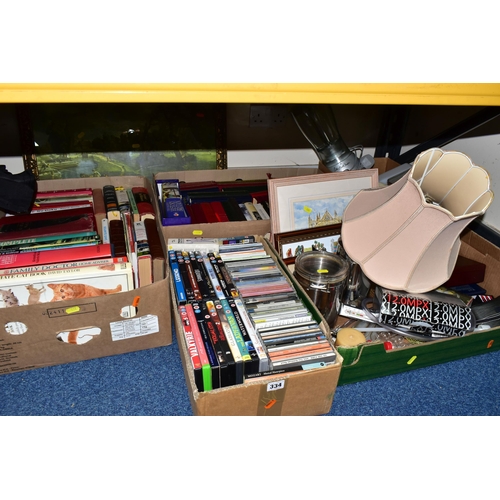 334 - FIVE BOXES OF BOOKS, CDS, DVDS AND KITCHEN EQUIPMENT, to include a Russell Hobbs 'Chelsea Teamaker',... 