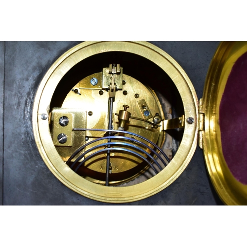 337 - A LATE VICTORIAN BLACK SLATE MANTEL CLOCK, with red marble columns, gilt foliate carved decoration t... 