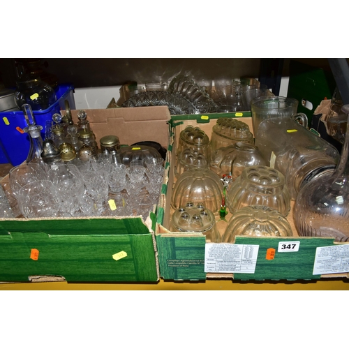 347 - THREE BOXES OF GLASSWARES, to include nine clear glass jelly moulds, pressed glass fruit bowls, a la... 