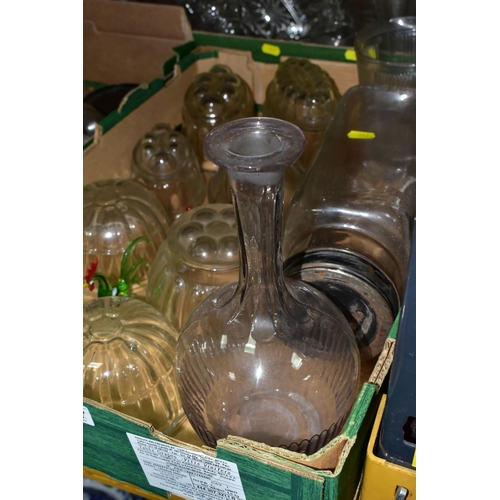 347 - THREE BOXES OF GLASSWARES, to include nine clear glass jelly moulds, pressed glass fruit bowls, a la... 