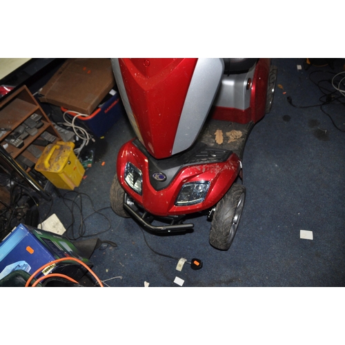 1002 - A KYMCO FOUR WHEELED MOBILITY SCOOTER with one key, charger, front and rear baskets (PAT pass and wo... 