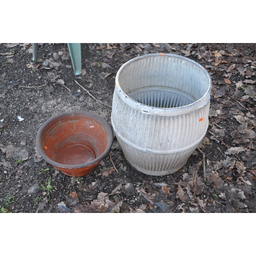 1009 - A VINTAGE GALVANISED DOLLY TUB 52cm high and a Terracotta planter 39cm in diameter (2)