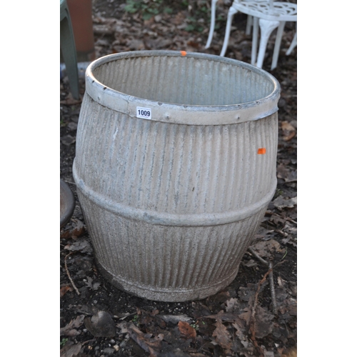 1009 - A VINTAGE GALVANISED DOLLY TUB 52cm high and a Terracotta planter 39cm in diameter (2)