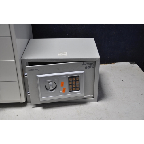 1051 - A MICROMARK ELECTRONIC SAFE 35cm wide (no key or code but locked open) and a modern six drawer metal... 