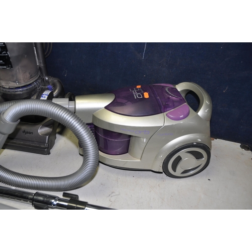 1053 - A DYSON DC33 UPRIGHT VACUUM CLEANER and a Morphy Richards Orb vacuum cleaner (missing filter from re... 