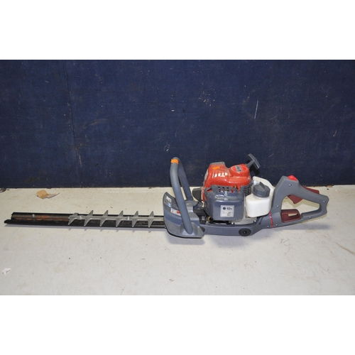 1060 - AN EMAC PETROL HEDGE TRIMMER with an Efco TG2650XP engine (looks unused)