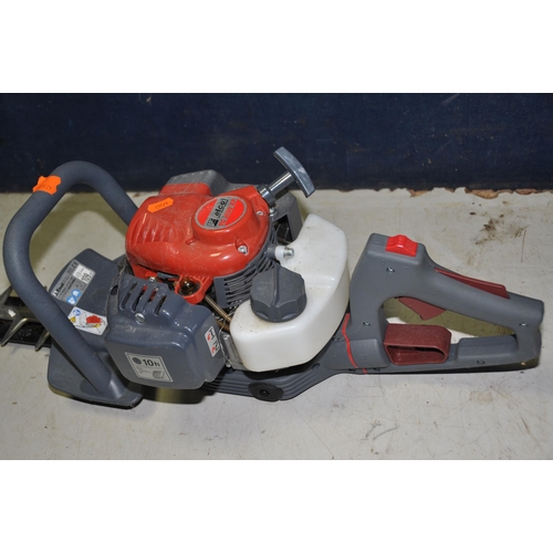 1060 - AN EMAC PETROL HEDGE TRIMMER with an Efco TG2650XP engine (looks unused)