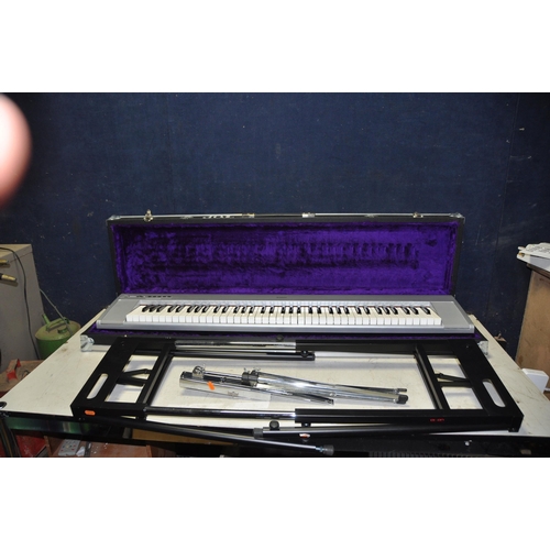 1062 - A YAMAHA NP-30 PORTABLE GRAND ELECTRIC PIANO in semi flight case with power supply, expression pedal... 