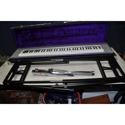 1062 - A YAMAHA NP-30 PORTABLE GRAND ELECTRIC PIANO in semi flight case with power supply, expression pedal... 